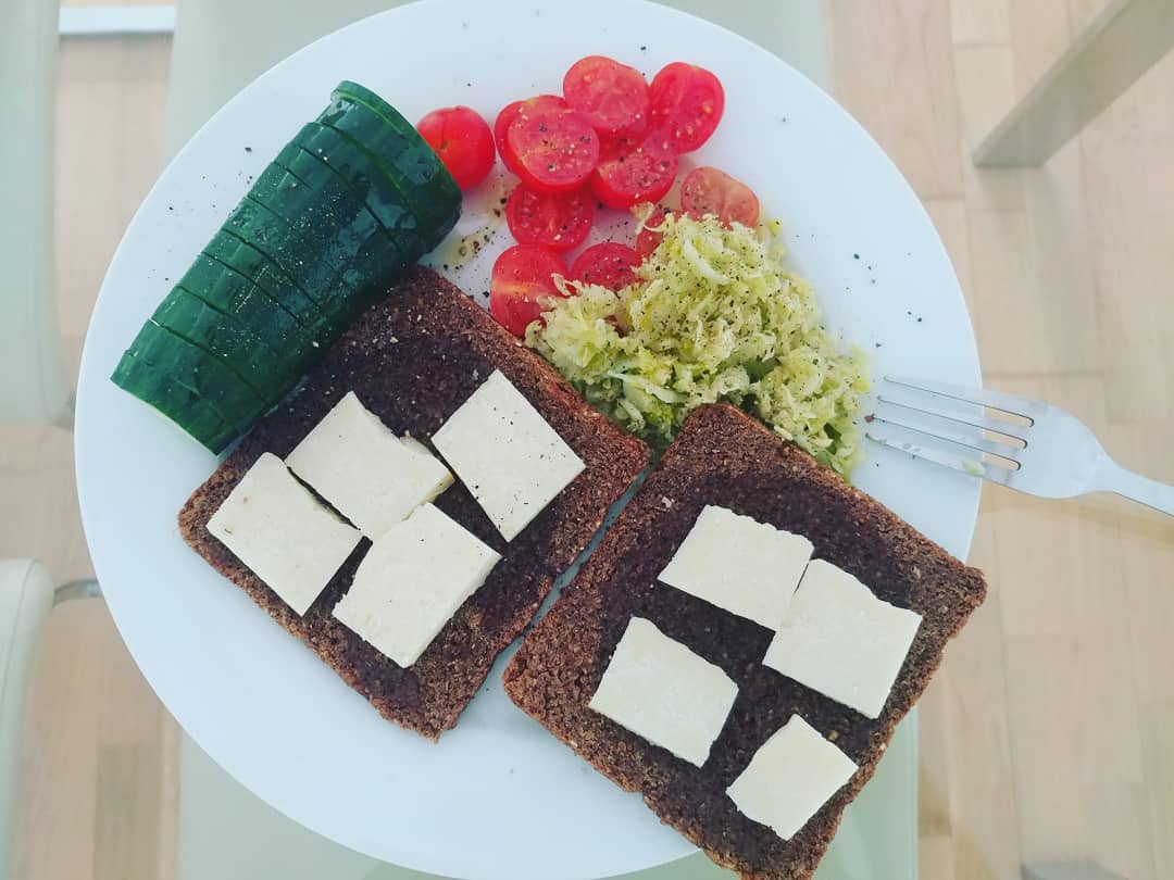 Rye Bread with Ghee (140 Herbs & Spices), Parmesan Cheese, Pickled Cabbage, Cucumber, Cherry Tomatoes. Dressed with Olive Oil, Himalayan Salt & Pepper. #breakfast #wholefood #wholefoods #ayurveda #ayurvedic #ghee #probiotic #vegatarian #cleanse #cleaneating #cleanliving #naturalnutrition